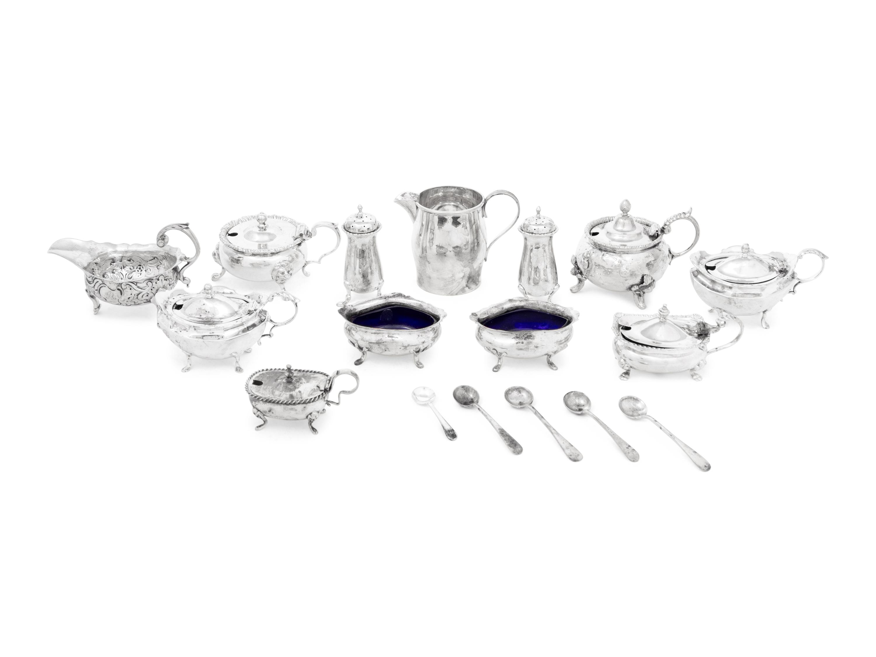A Group of Twelve Silver Serving Articles