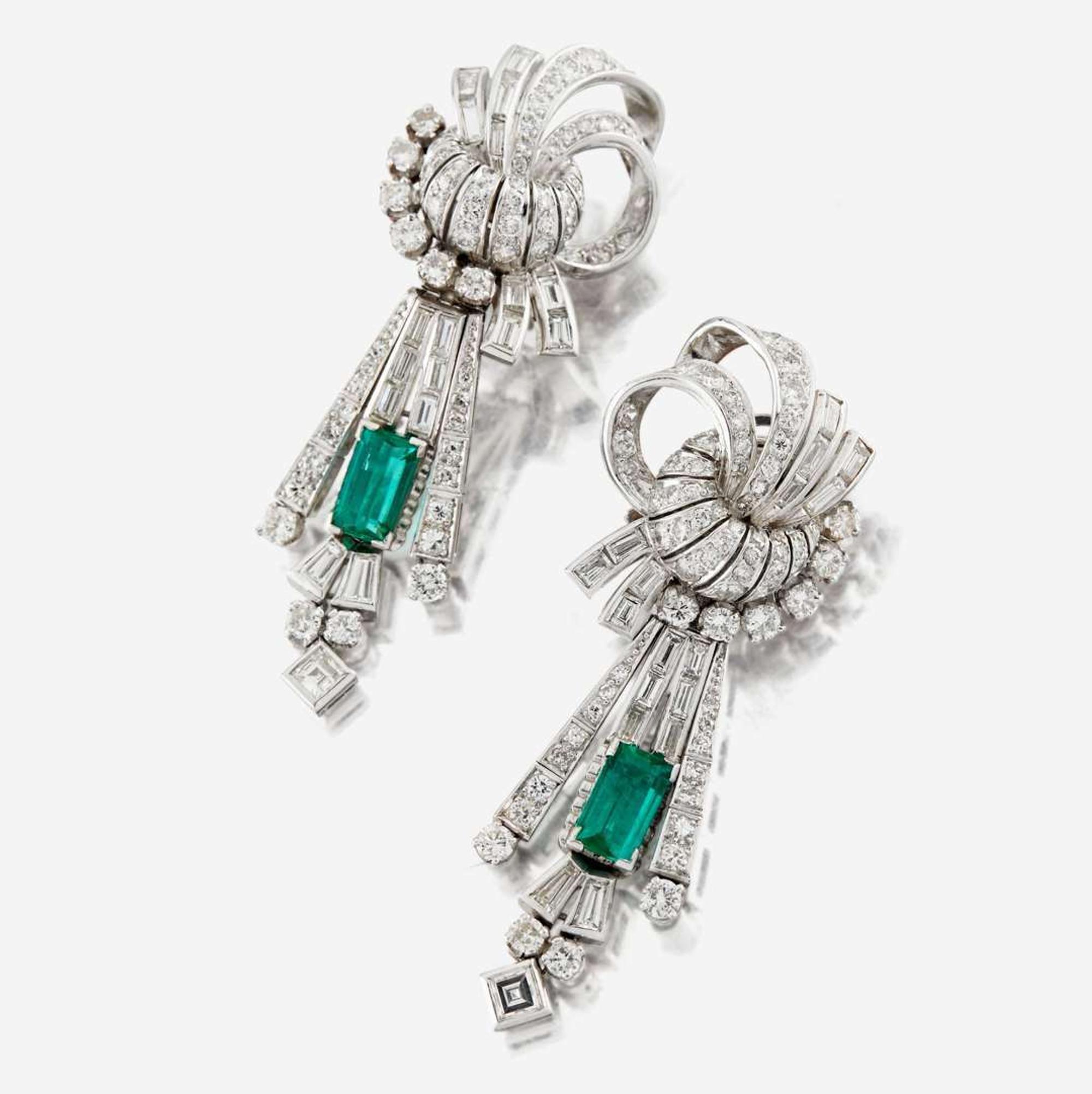 A pair of diamond, emerald, and platinum day/night earrings
