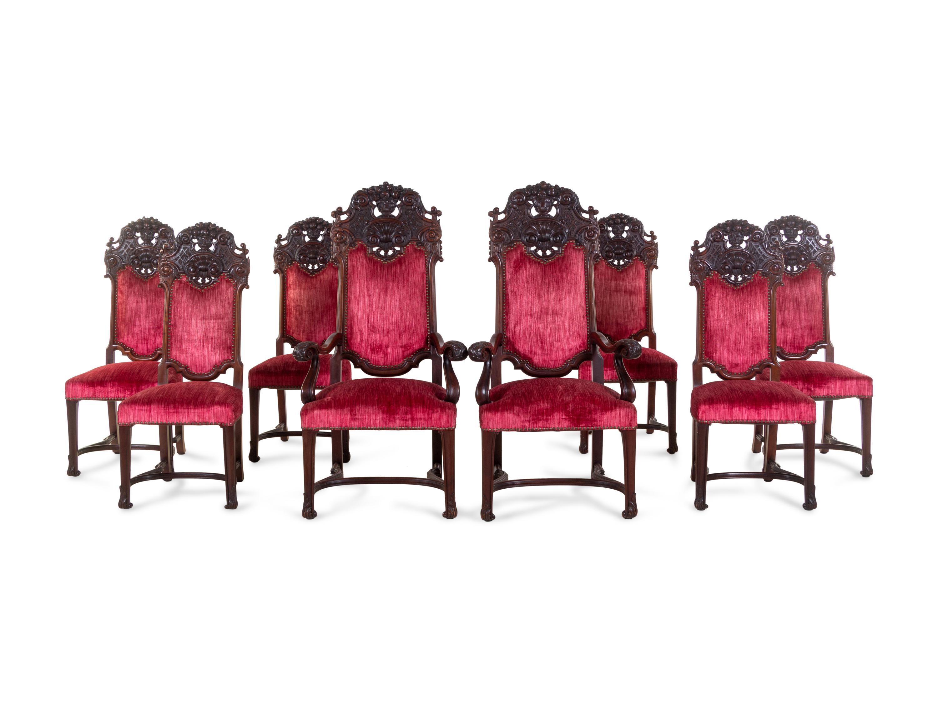 A Set of Eight Renaissance Style Carved Mahogany Dining Chairs