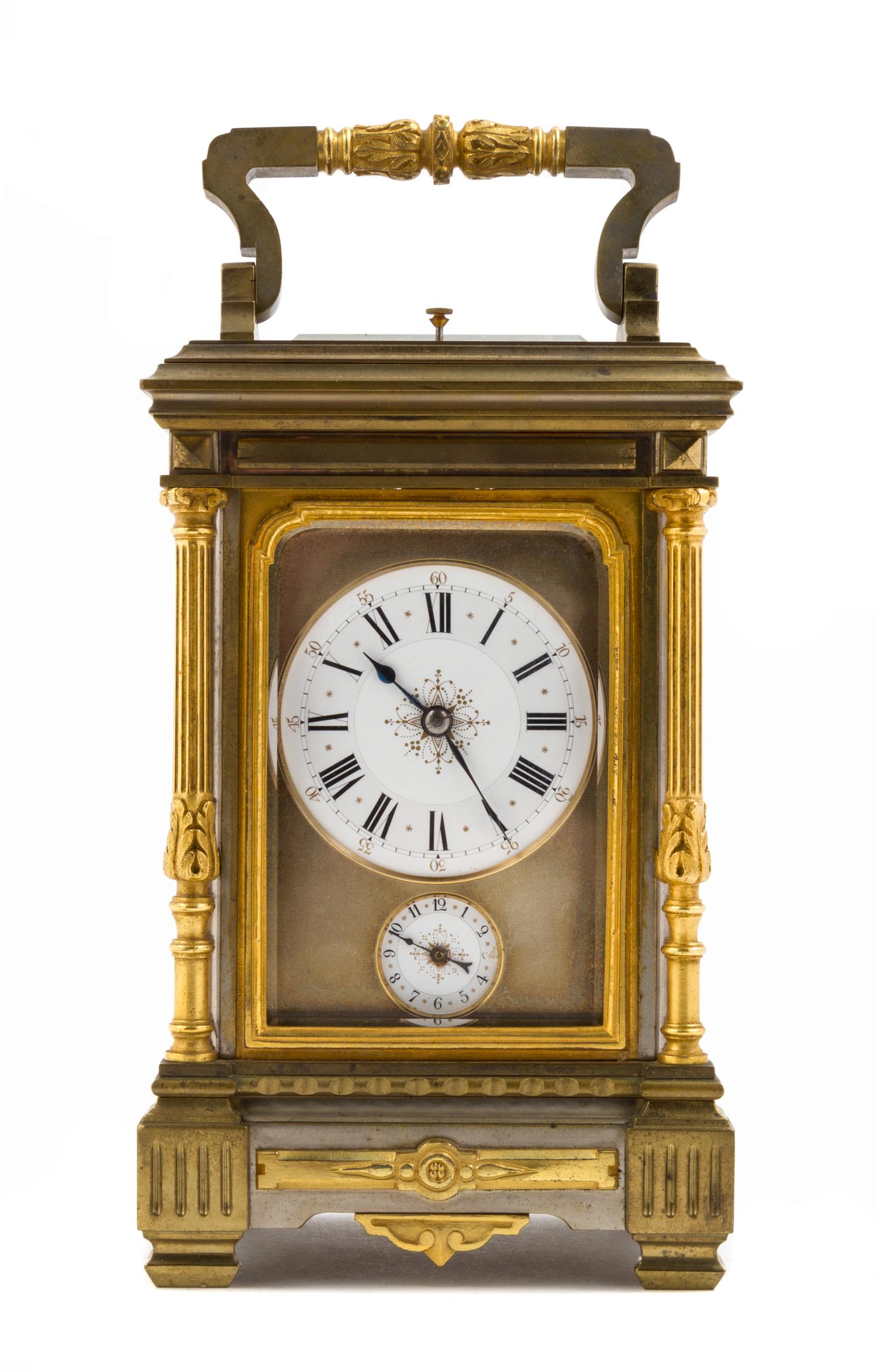 A French Parcel Gilt Bronze Repeating Carriage Clock Height 8 1/4 inches. — RETAILED BY TIFFANY & CO., EARLY 20TH CENTURY