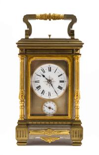 A French Parcel Gilt Bronze Repeating Carriage Clock Height 8 1/4 inches. — RETAILED BY TIFFANY & CO., EARLY 20TH CENTURY