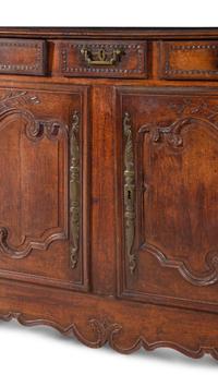 A French Provincial Carved Oak Cabinet