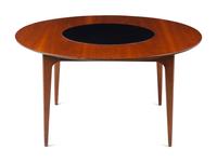 A Modernist Walnut Round Table