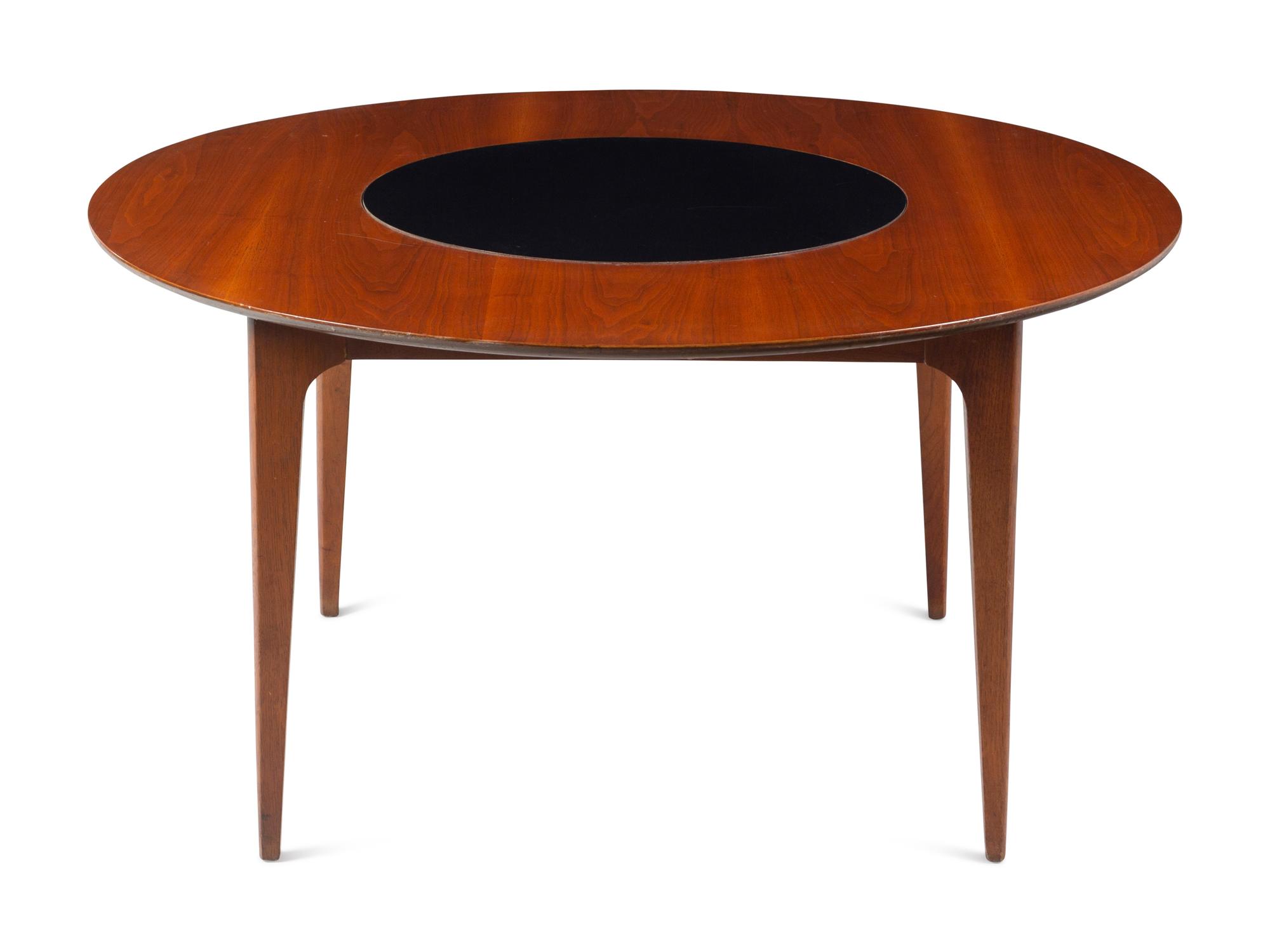 A Modernist Walnut Round Table