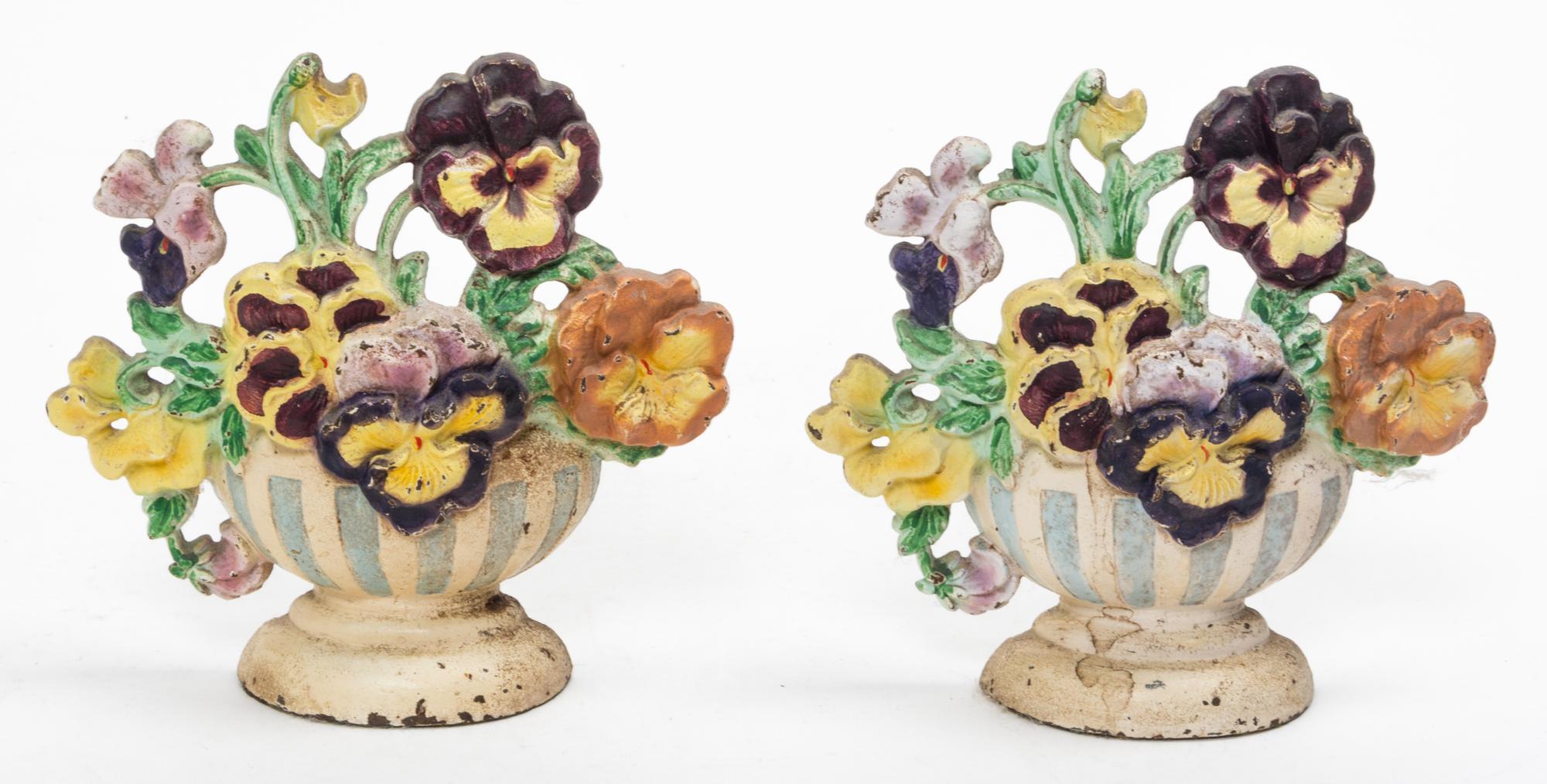 A Pair of Victorian Polychrome Decorated Wrought Iron Doorstops Height 7 inches. — 19TH CENTURY