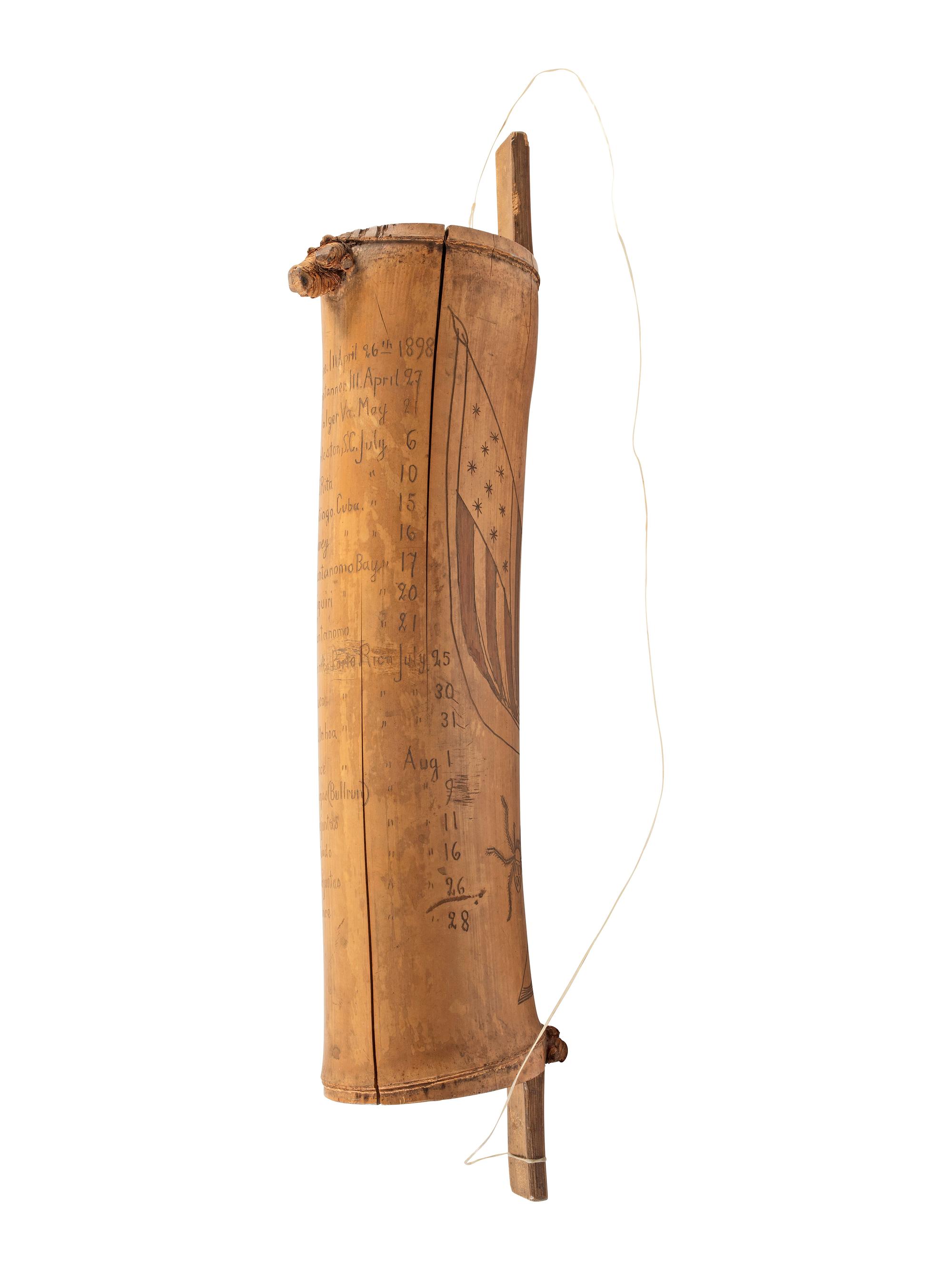 [SPANISH AMERICAN WAR]. Spanish American War-period bamboo canteen with folk art decoration. Ca late 19th century.