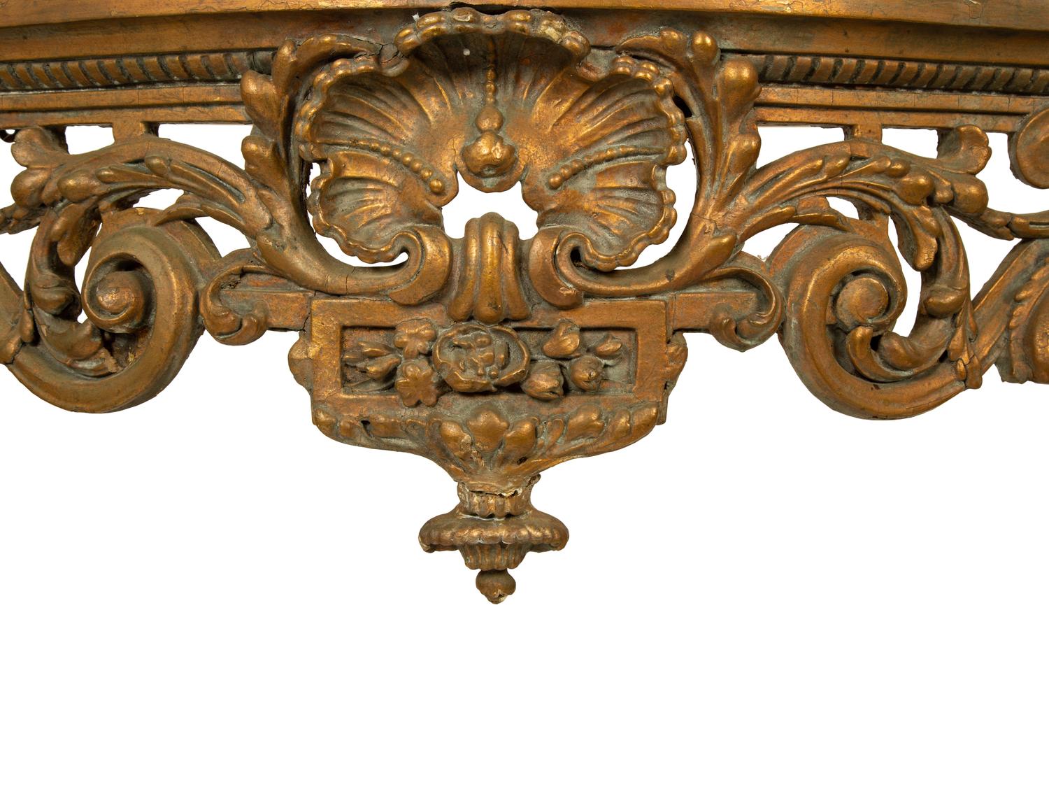 A Louis XV Carved Gilt Wood Serpentine Marble Top Console Table — 18TH/19TH CENTURY