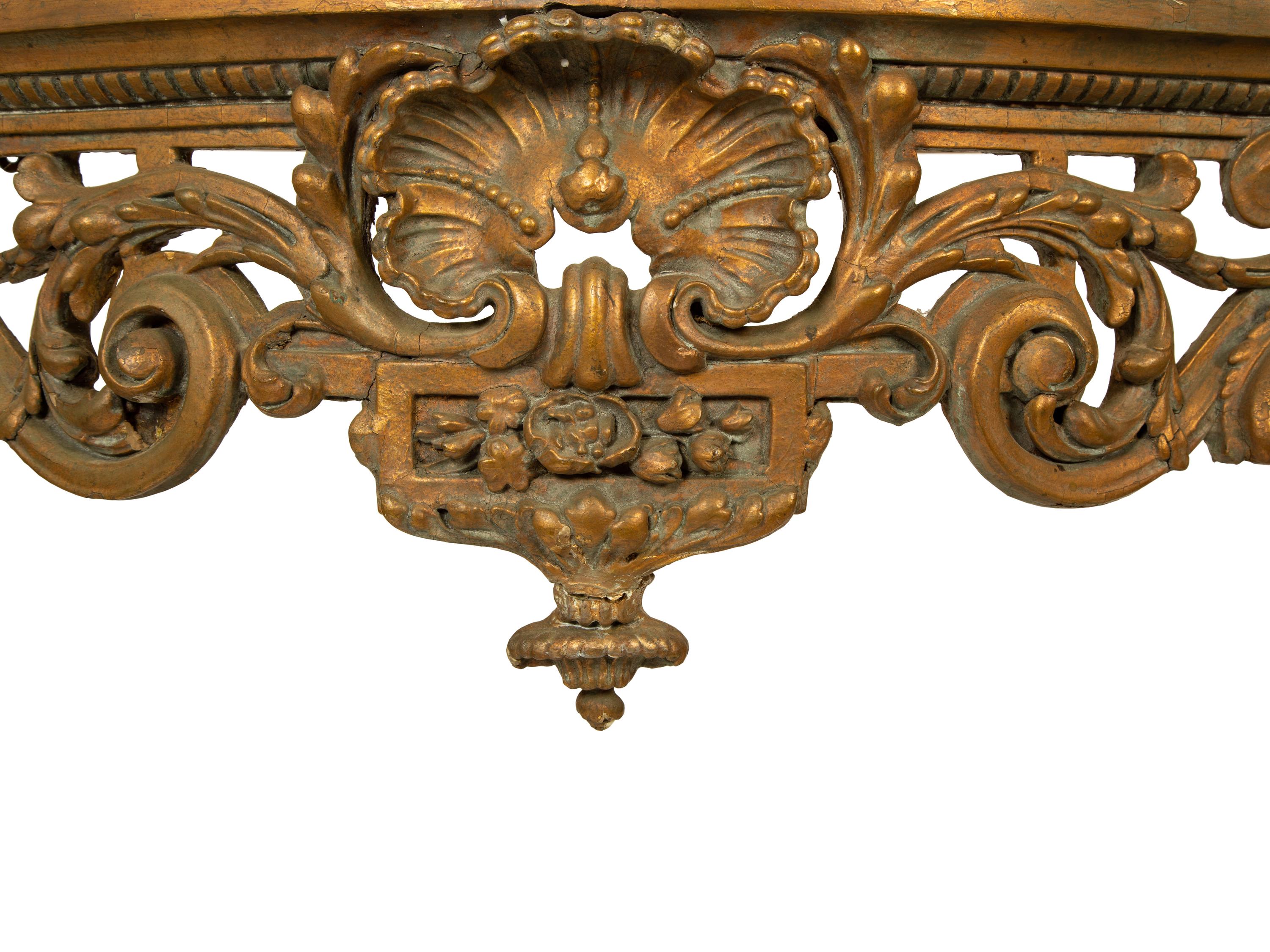 A Louis XV Carved Gilt Wood Serpentine Marble Top Console Table — 18TH/19TH CENTURY