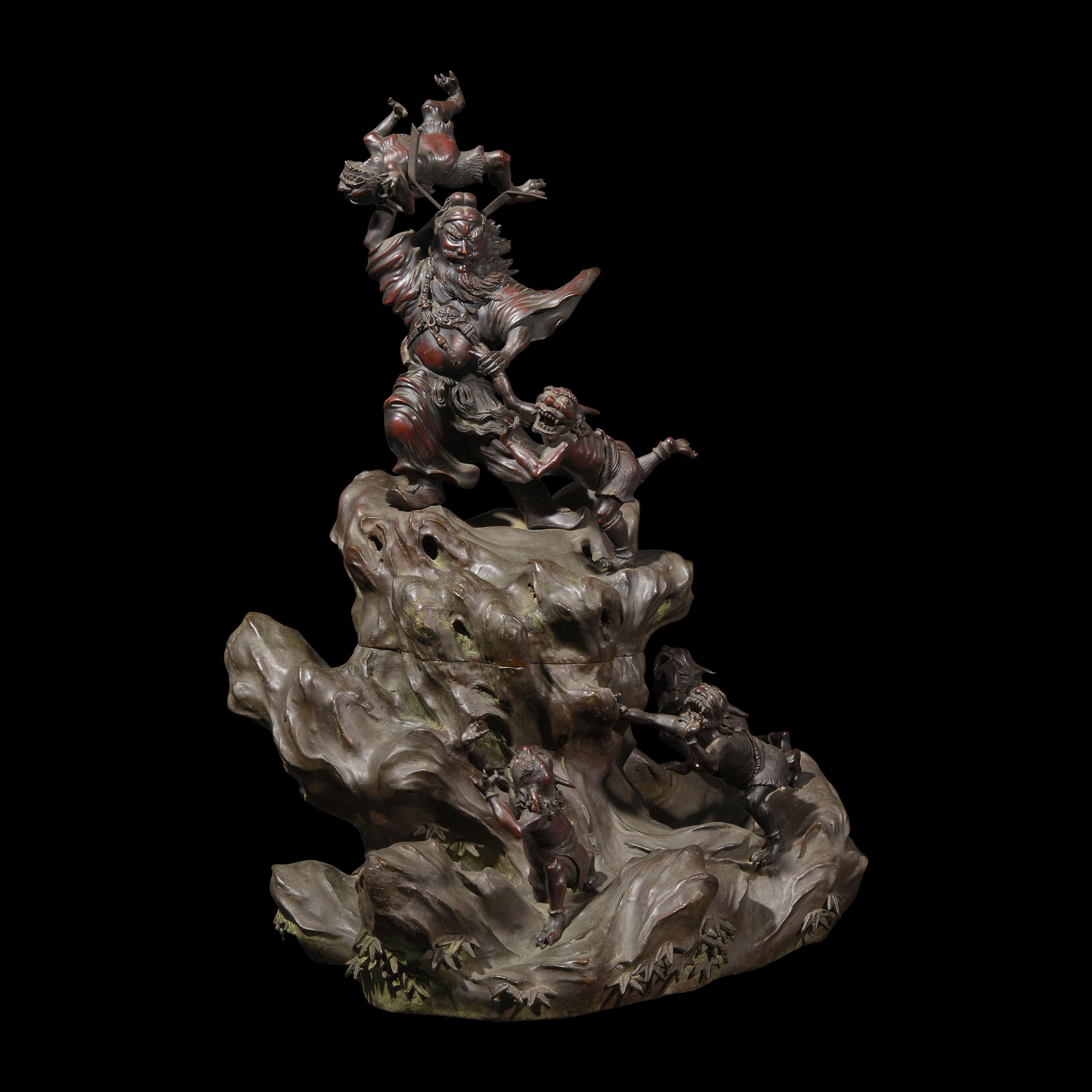 A Japanese Patinated Bronze and Metal S hoki and Oni Figural Koro, Meiji Period 日本明治時代 銅雕鍾馗捉鬼