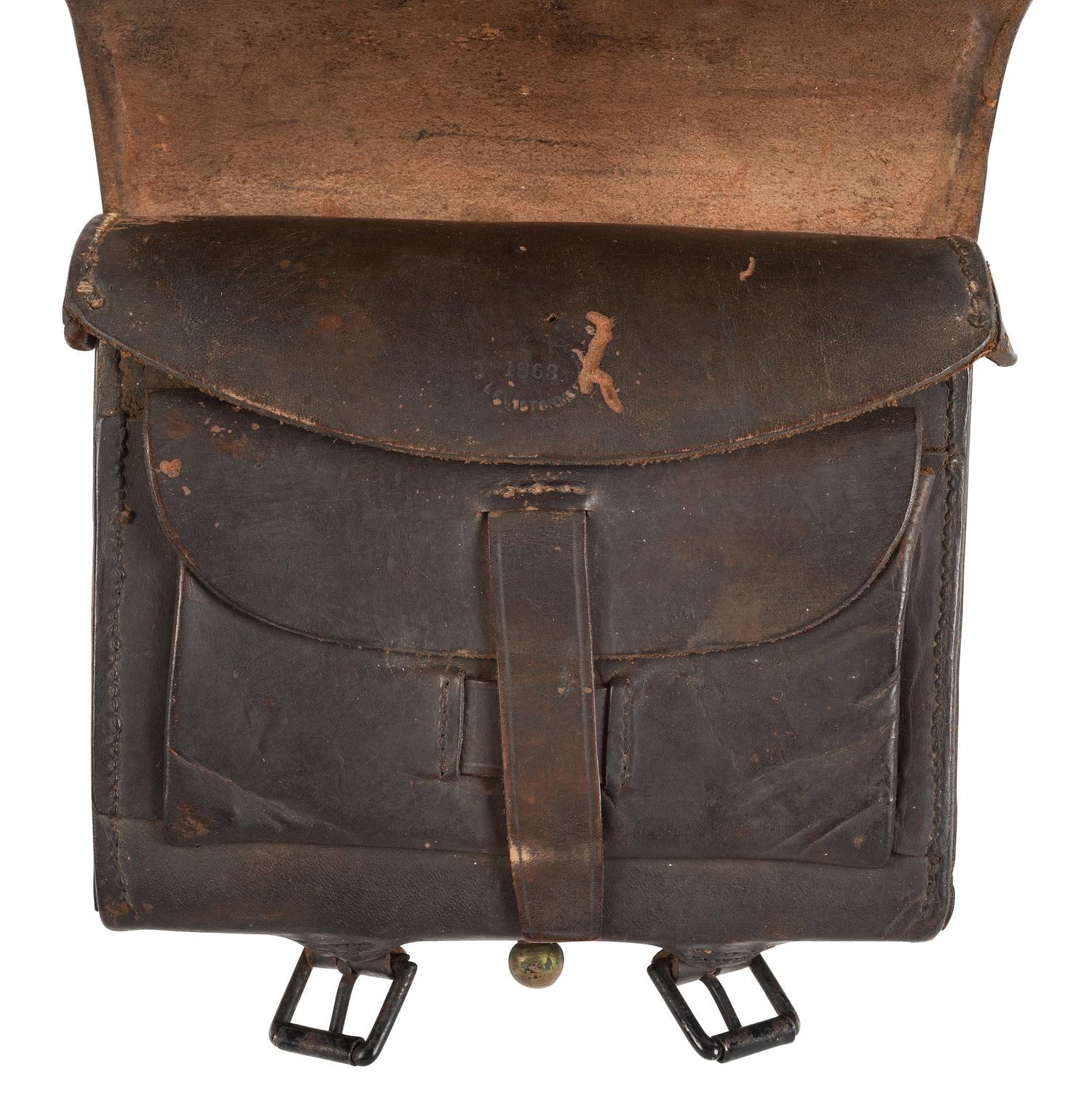 [CIVIL WAR]. Civil War-era militaria including belt, cap pouch, and field glasses.