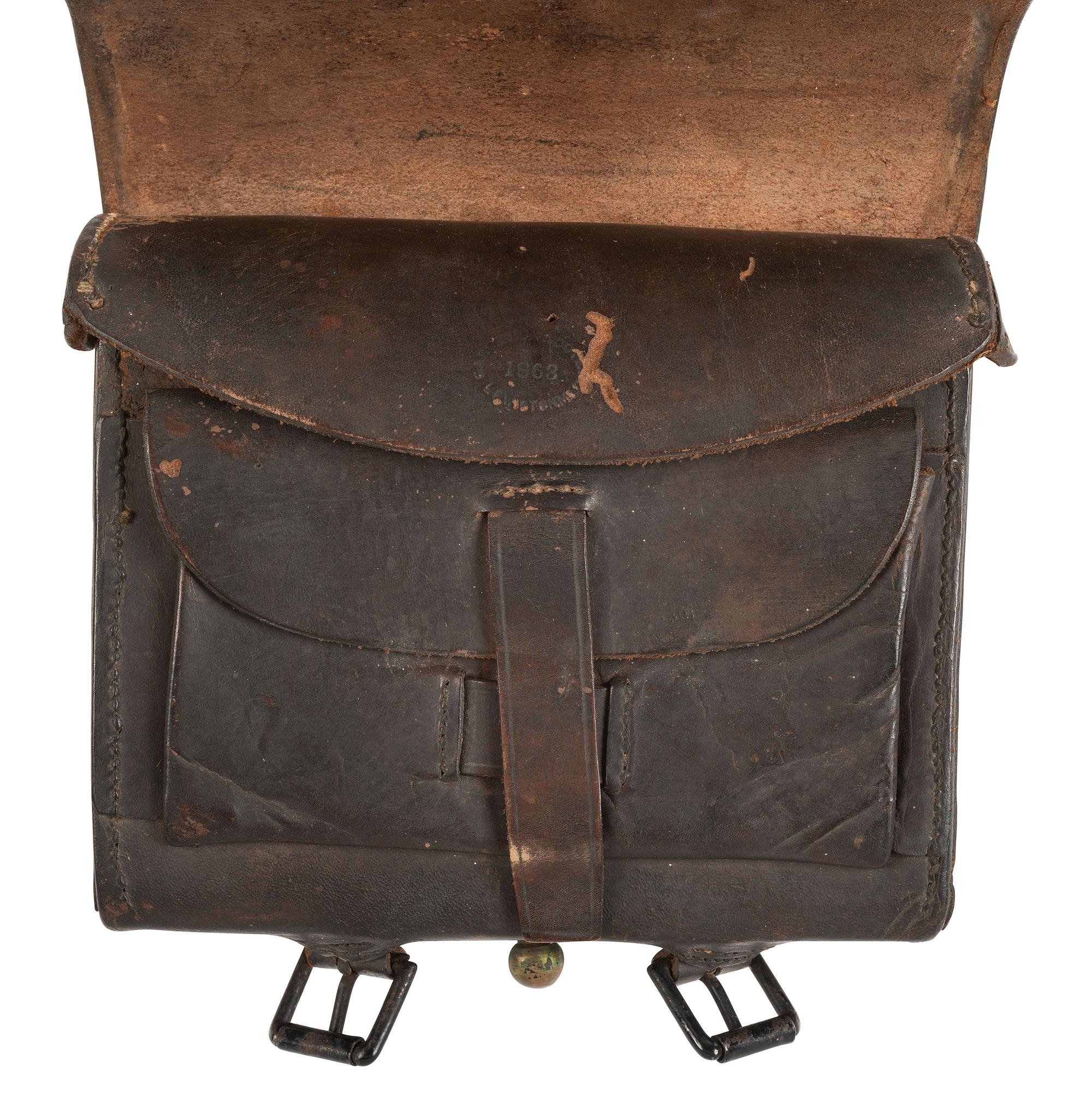 [CIVIL WAR]. Civil War-era militaria including belt, cap pouch, and field glasses.