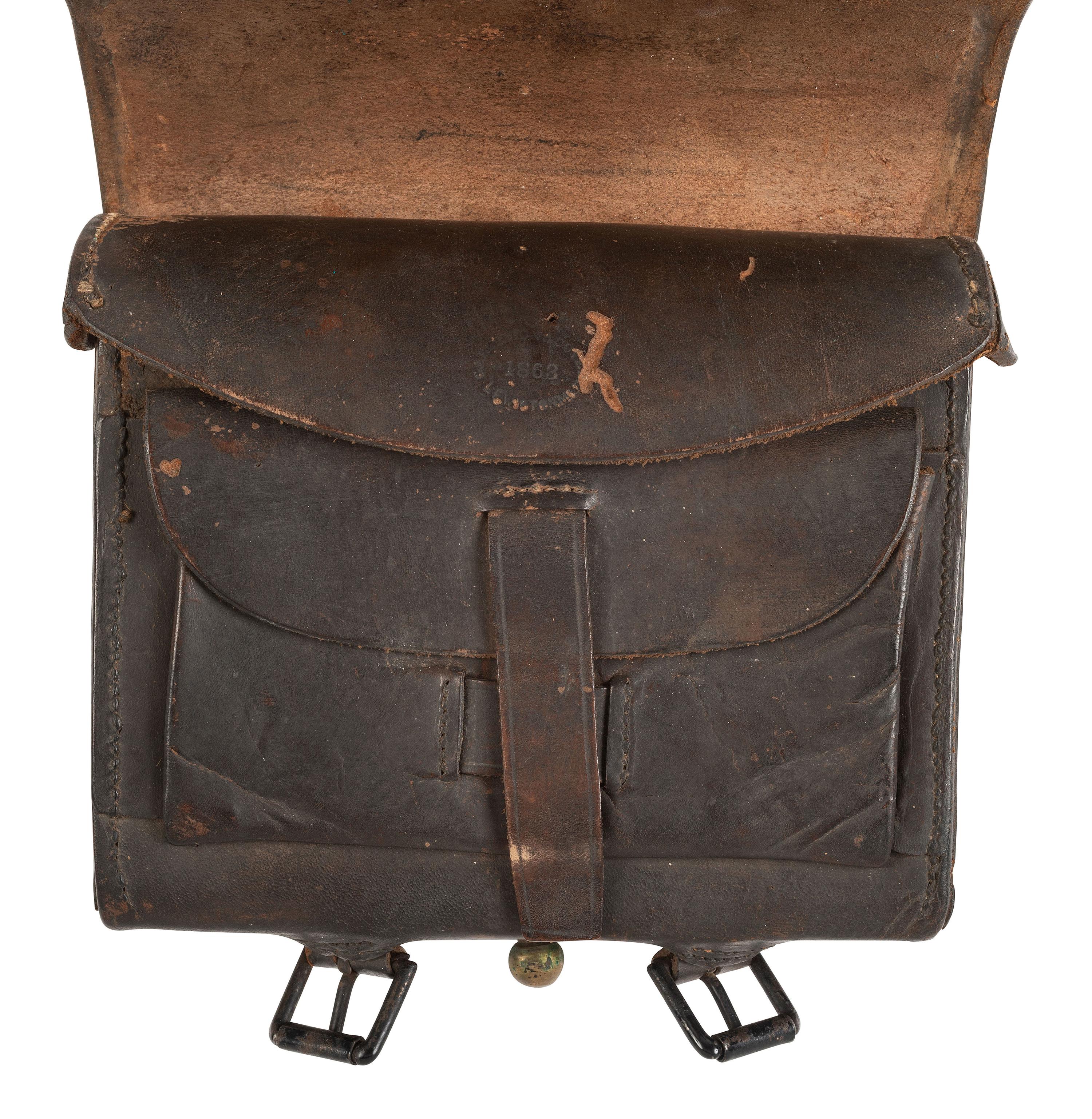 [CIVIL WAR]. Civil War-era militaria including belt, cap pouch, and field glasses.