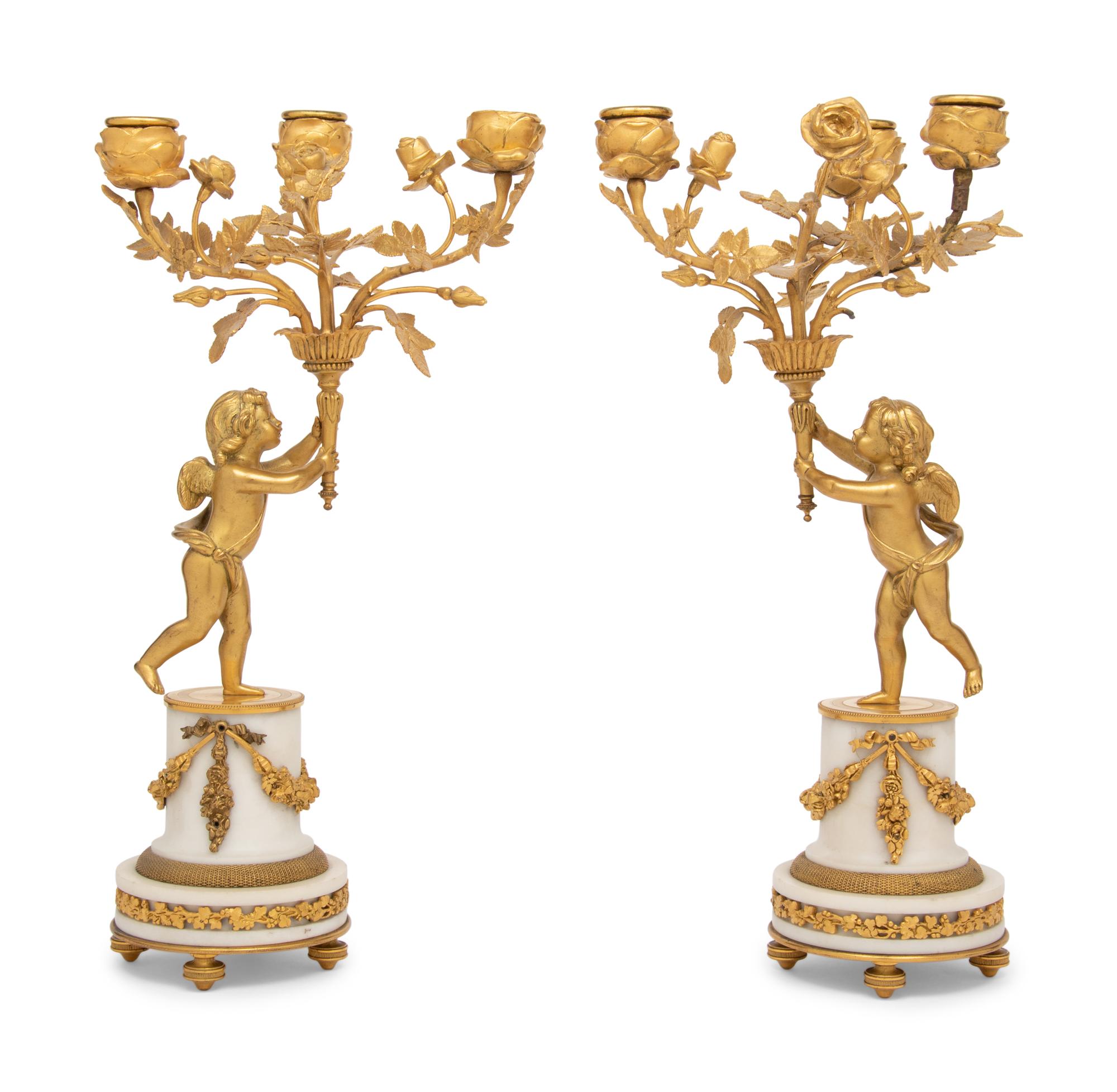 A Pair of Louis XV Style Gilt Bronze and Marble Three-Light Candelabra