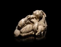 A Chinese Chicken Bone Jade Figural 'Three Rams' Group