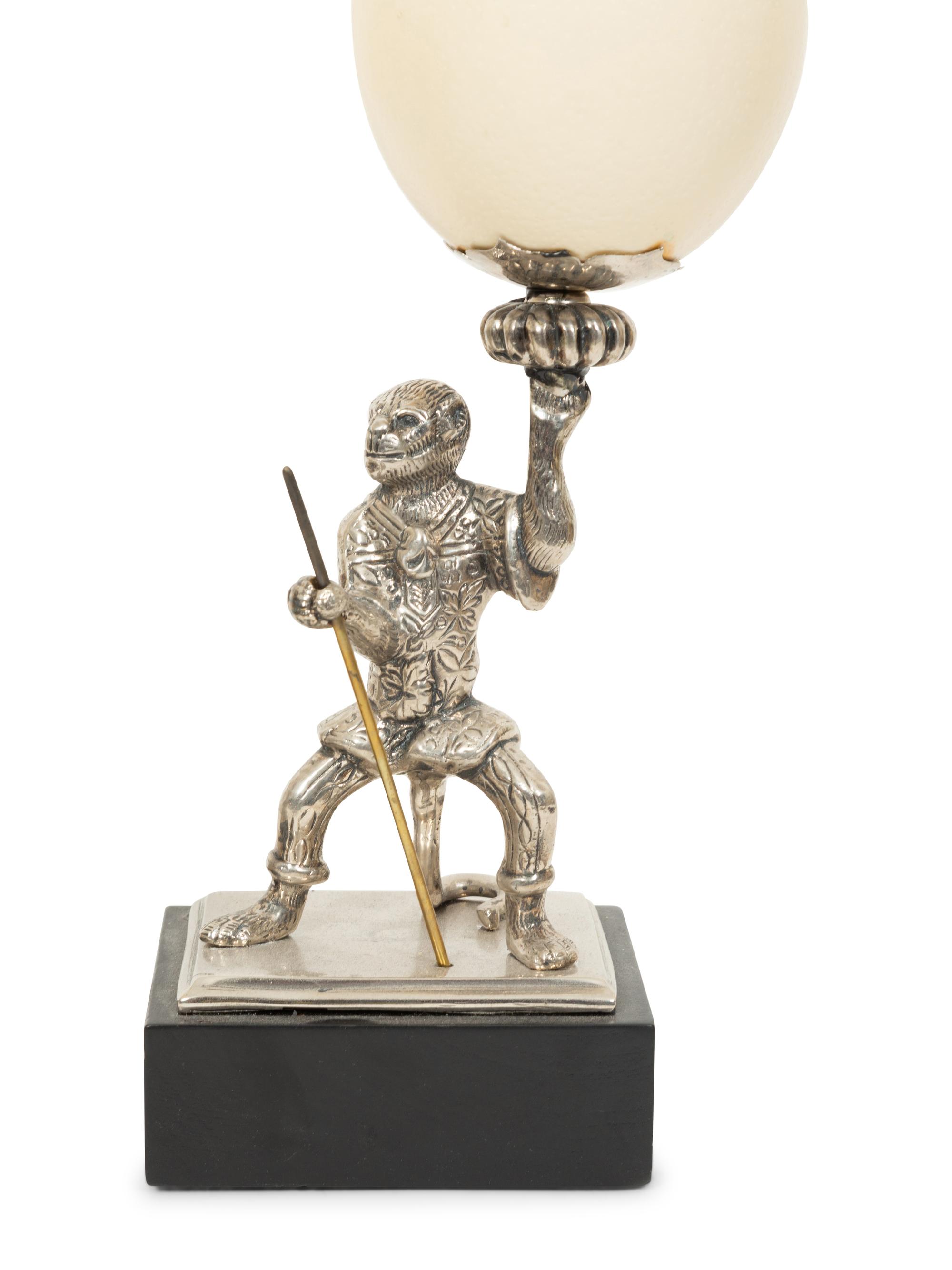 A Pair of Anthony Redmile Ostrich Egg and Nickel-Plated Candlesticks