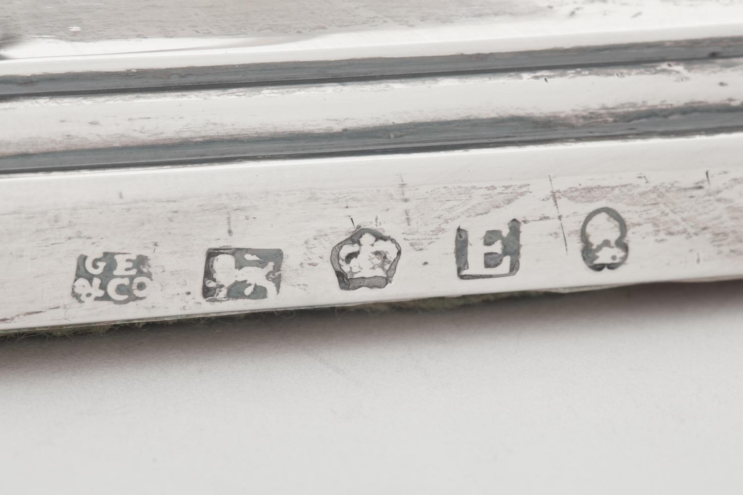A Pair of George III Silver Candlesticks