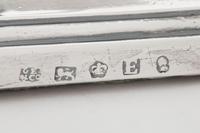 A Pair of George III Silver Candlesticks