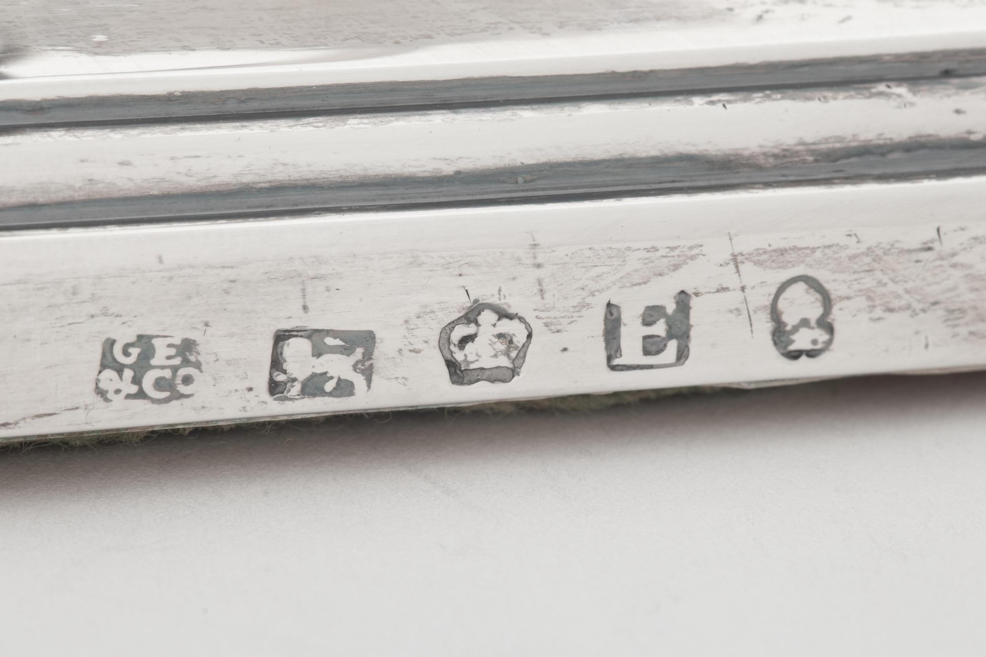 A Pair of George III Silver Candlesticks