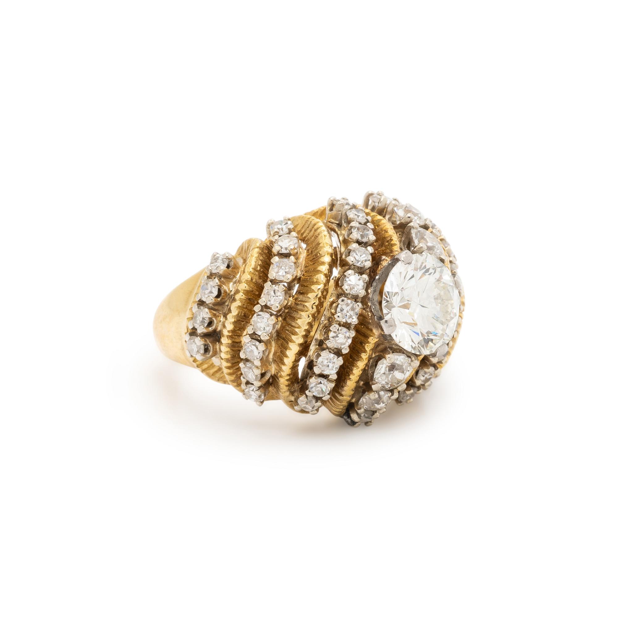 HAMMERMAN BROTHERS, DIAMOND, PLATINUM, AND YELLOW GOLD BOMBÉ RING