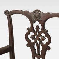 A pair of Chippendale style carved mahogany armchairs late 19th / early 20th century