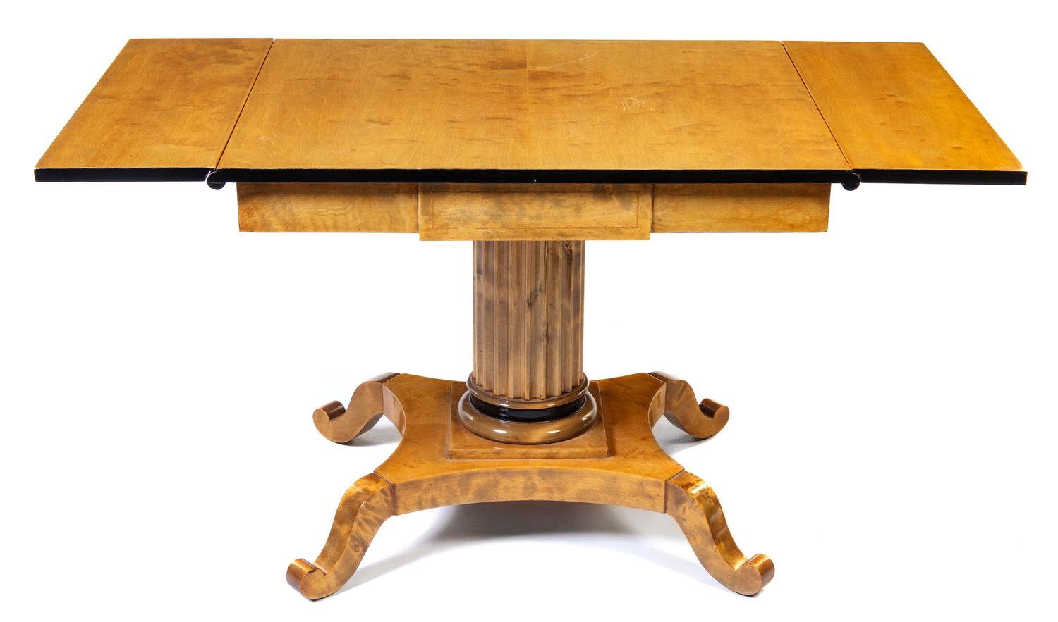 A Biedermeier Style Drop-Leaf Table Height 28 3/4 x width 53 (fully extended) x depth 27 1/4 inches. — 20TH CENTURY