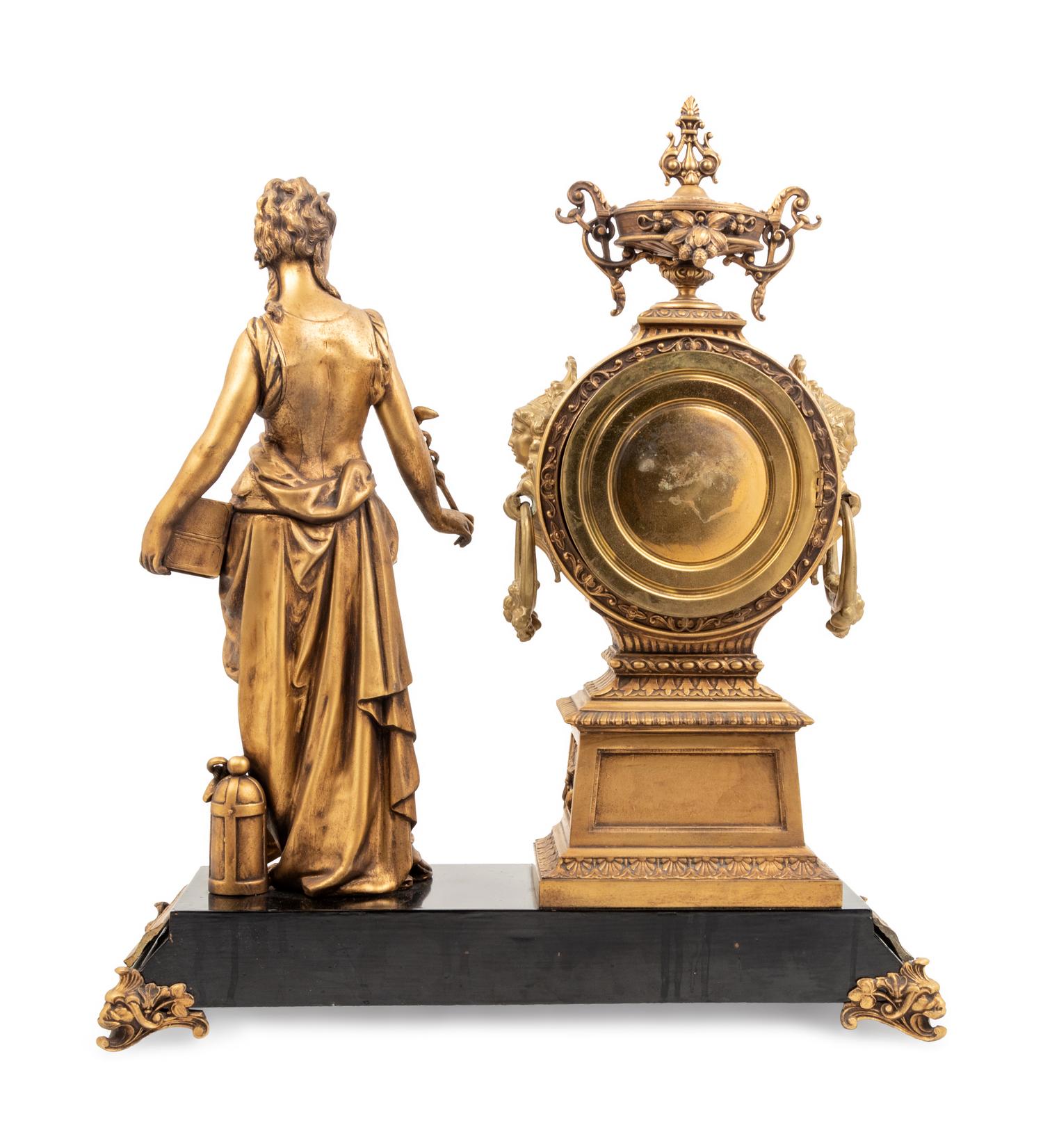 An Ansonia Commerce Gilt Metal Figural Mantel Clock