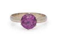 A 14 Karat White Gold and Synthetic Color Change Sapphire Ring,