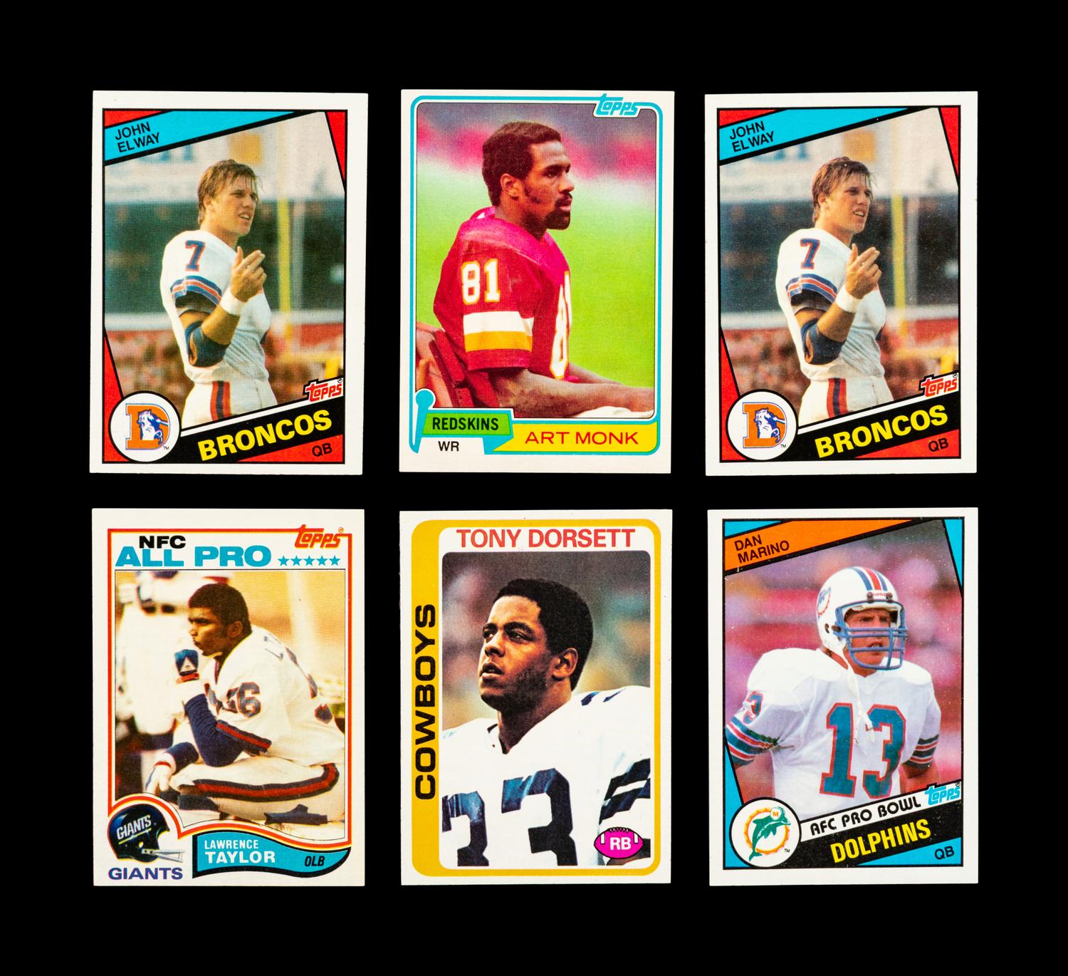 A Group of Six Topps Football Hall of Fame Rookie Cards (Including Tony Dorsett, John Elway, Dan Marino, Art Monk, Lawrence Taylor)