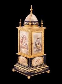 A Royal Vienna Porcelain Mounted Gilt Bronze Clock, Couaillet