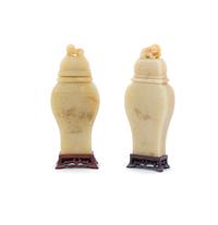 A Pair of Chinese Carved Stone Vases Height of covered vase 10 1/2 inches. — 20TH CENTURY