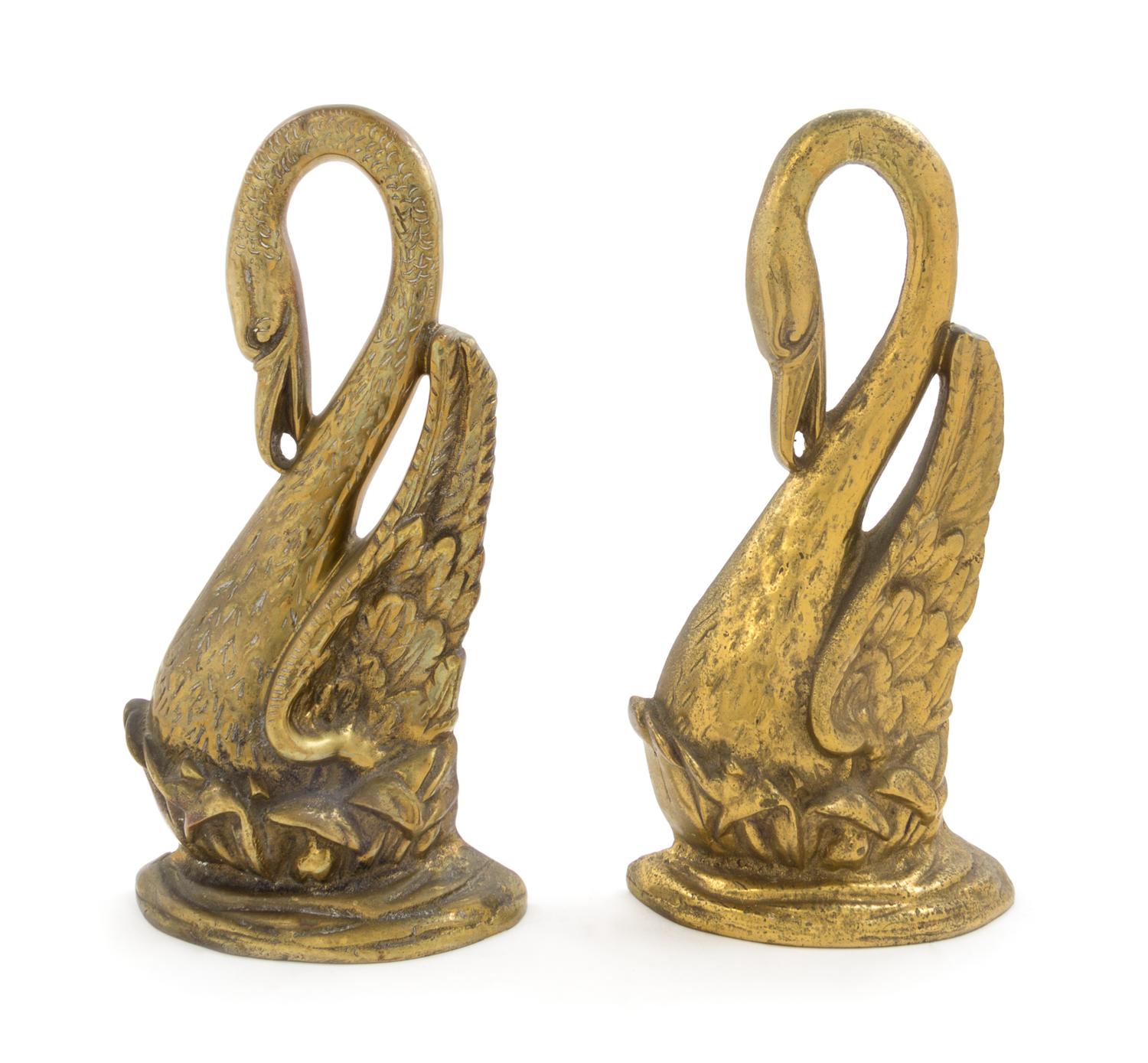 A Matched Pair of Victorian Gilt Metal Doorstops Height of tallest 14 1/4 inches.