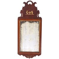 A Queen Anne Parcel Gilt and Carved Walnut Looking Glass