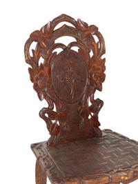 Three Black Forest Carved Side Chairs