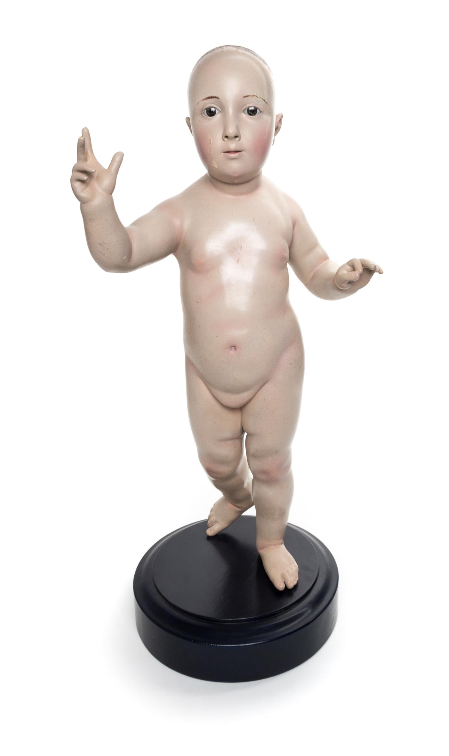 A Continental Painted Wood Figure Height 23 inches.