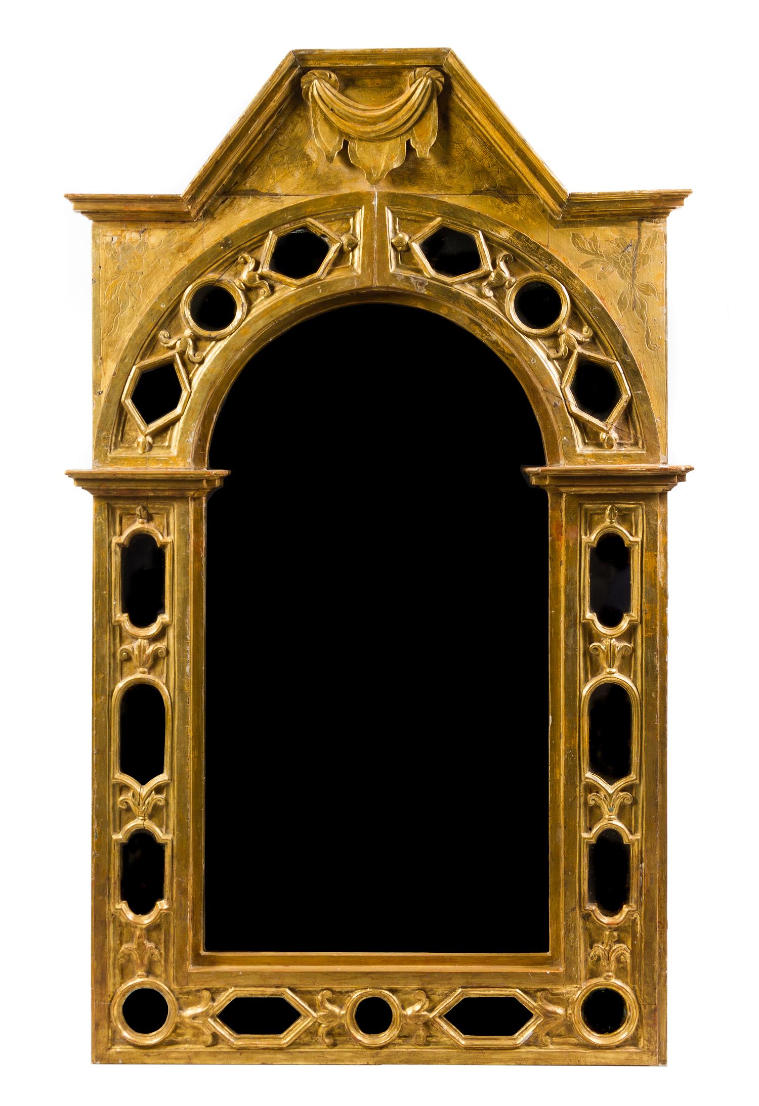 An Italian Baroque Style Giltwood Mirror 69 1/2 x 42 3/4 inches. — INCORPORATING 18TH CENTURY ELEMENTS