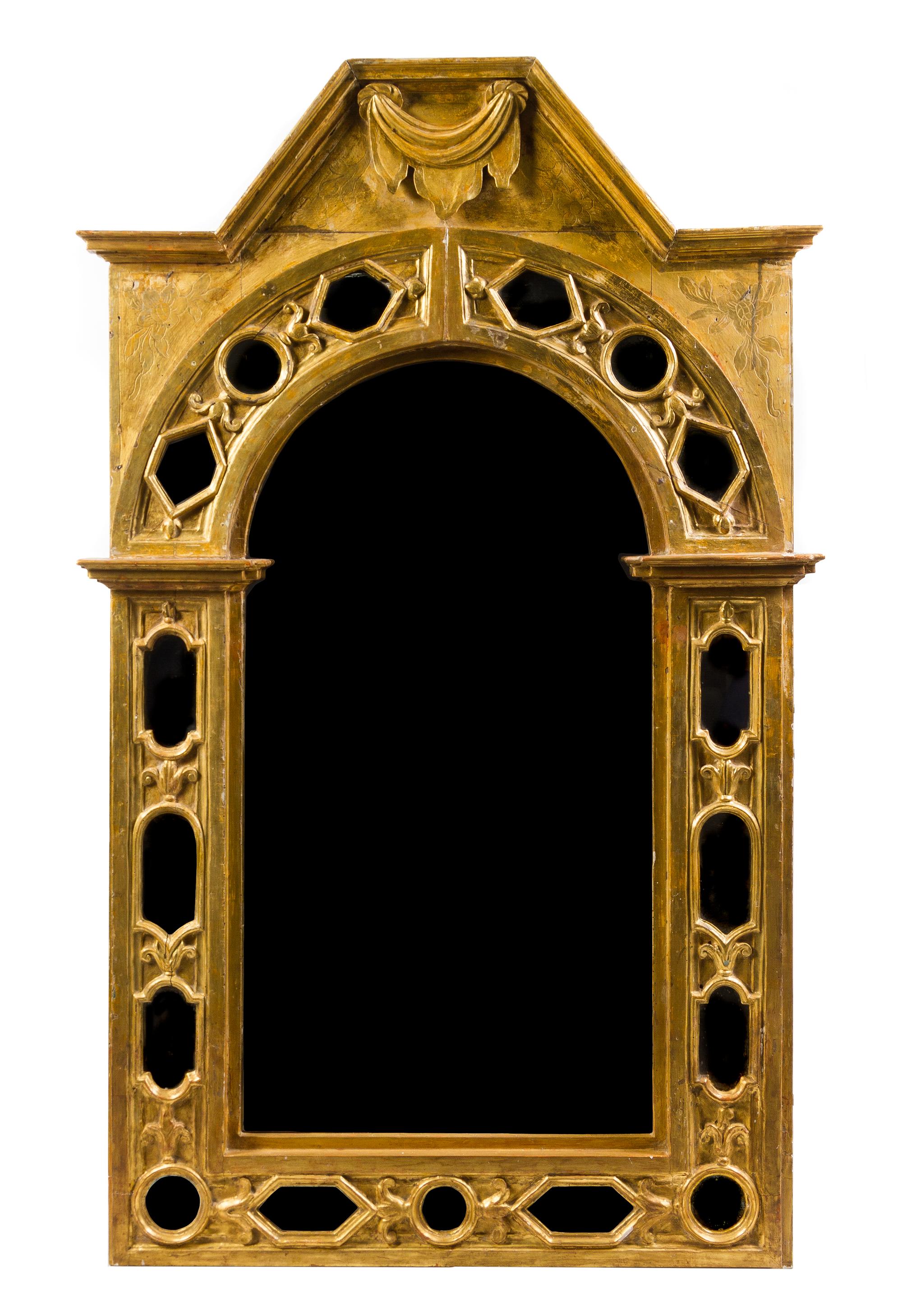 An Italian Baroque Style Giltwood Mirror 69 1/2 x 42 3/4 inches. — INCORPORATING 18TH CENTURY ELEMENTS