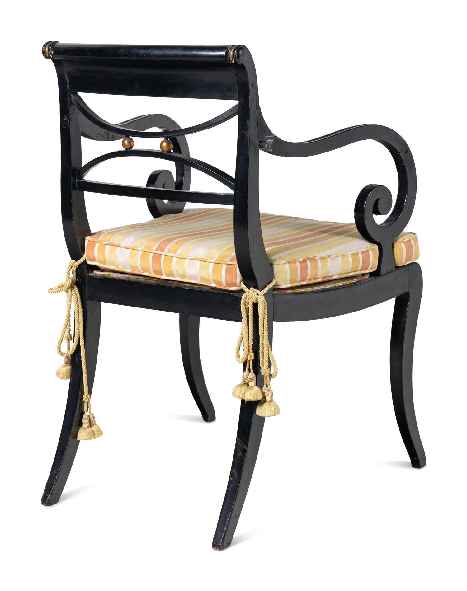 A Pair of Regency Black and Gold-Painted Armchairs