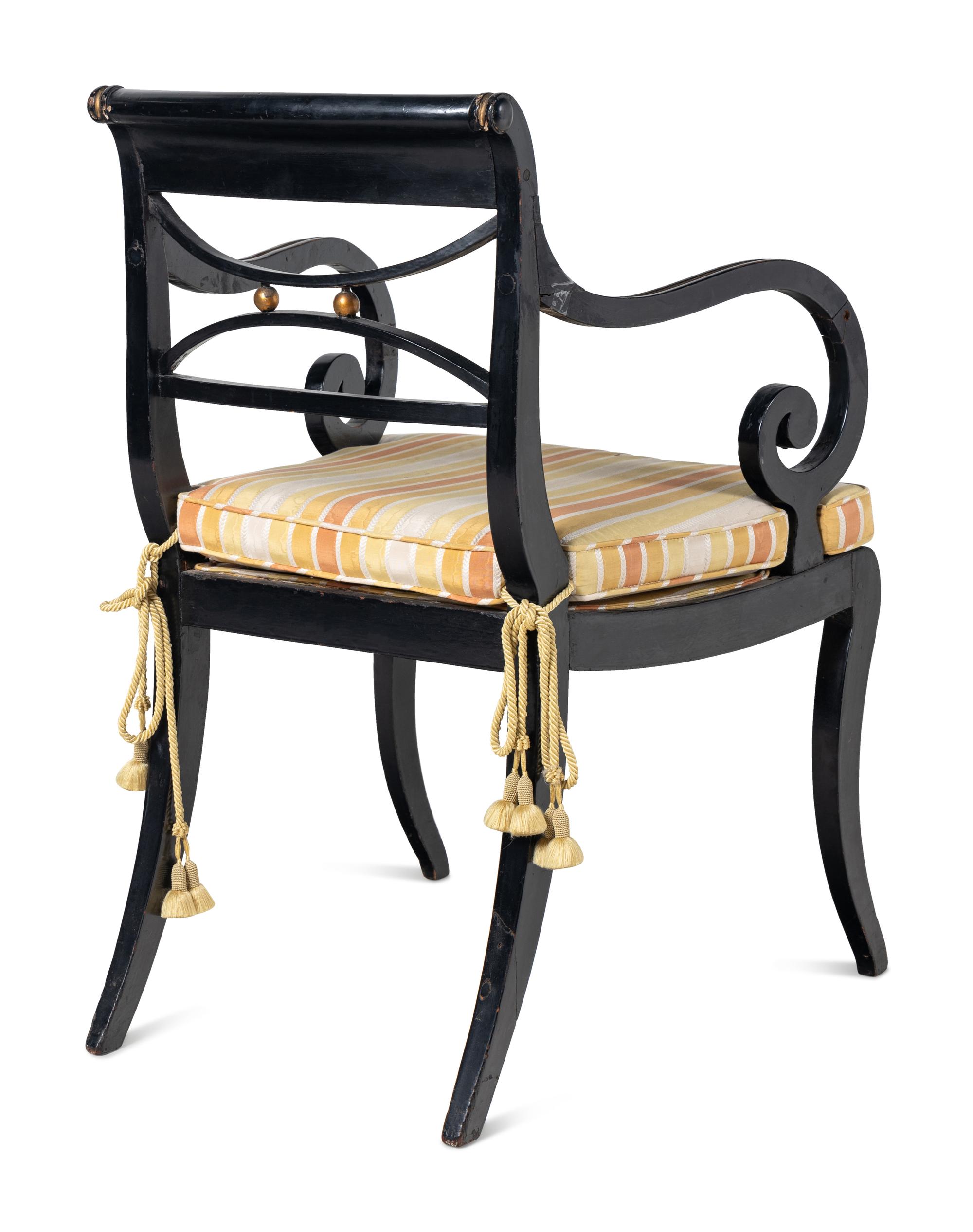 A Pair of Regency Black and Gold-Painted Armchairs