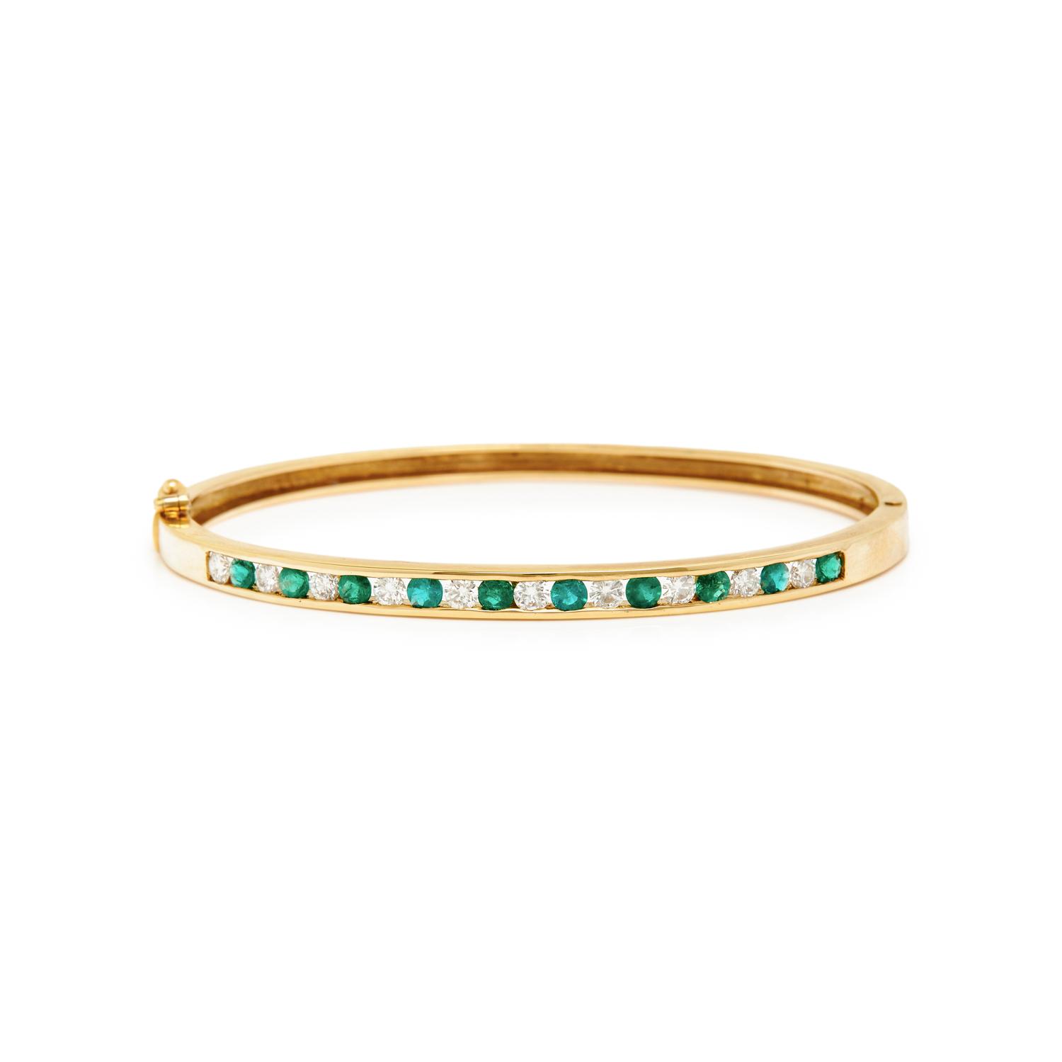 YELLOW GOLD, RUBY, EMERALD, AND DIAMOND BANGLES