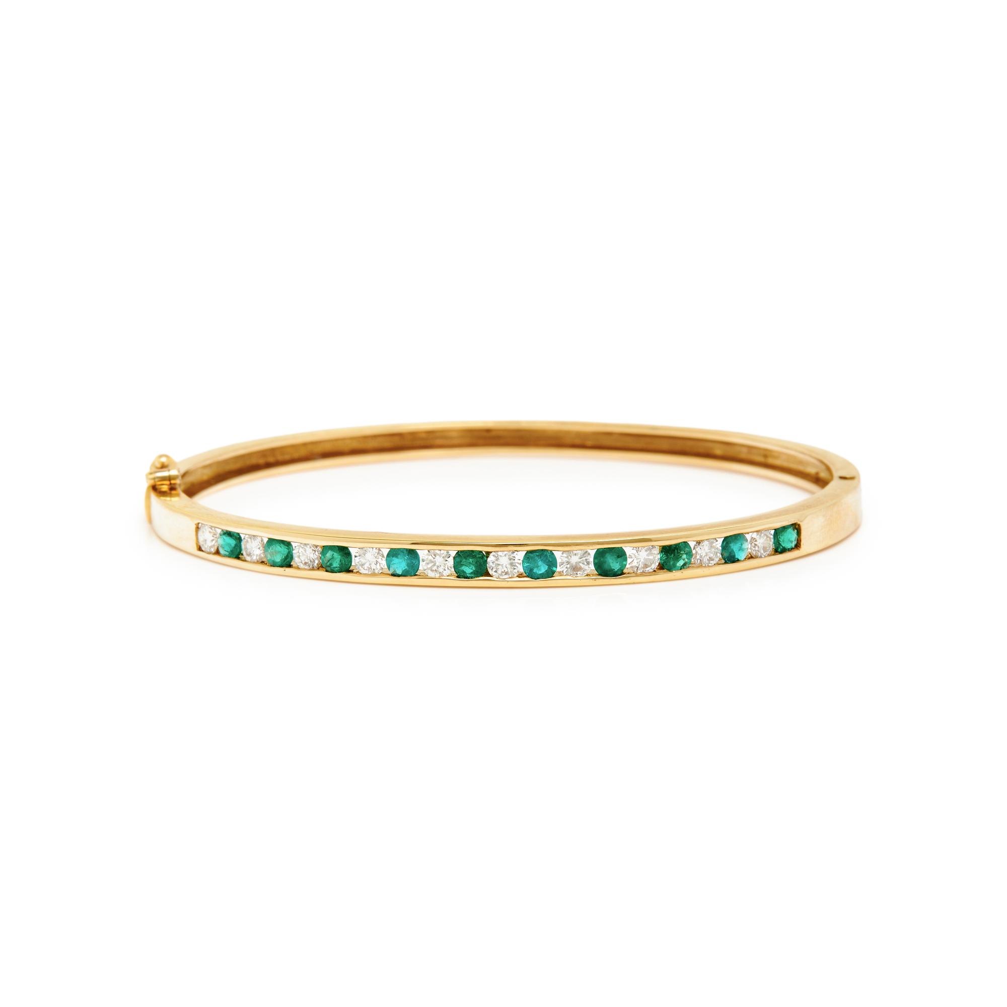 YELLOW GOLD, RUBY, EMERALD, AND DIAMOND BANGLES