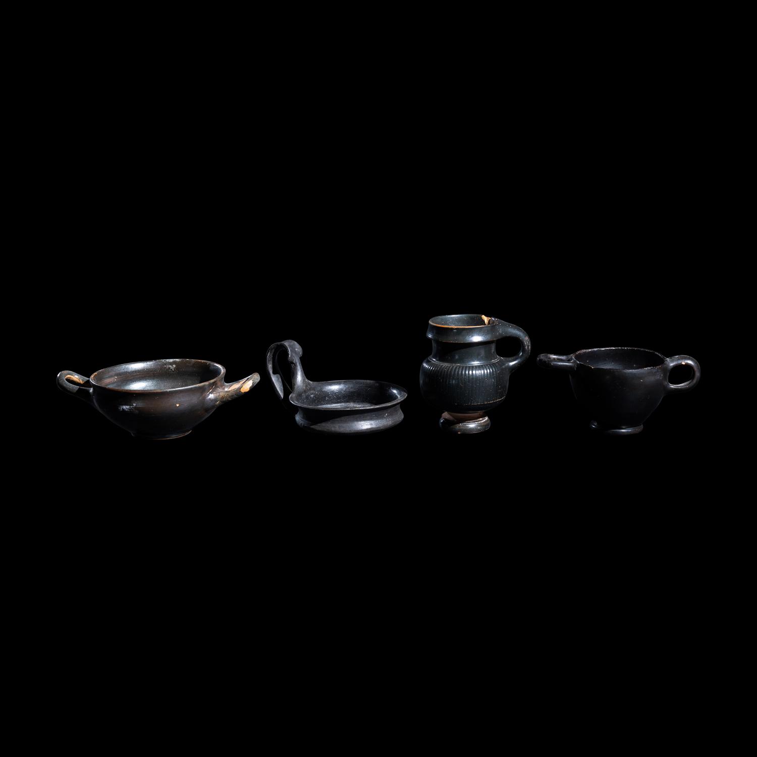 A Group of 7 Greek Black-Glazed Vessels