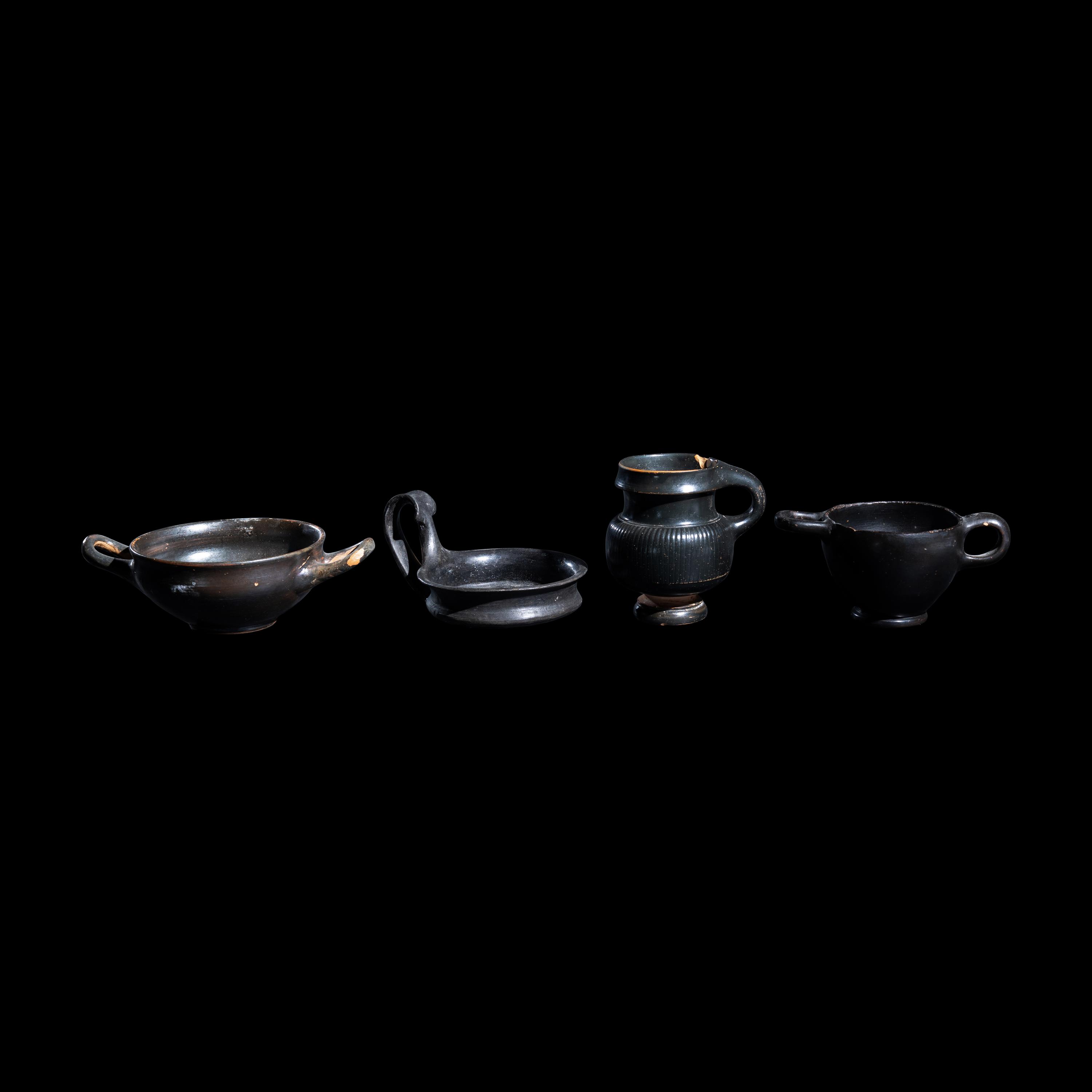A Group of 7 Greek Black-Glazed Vessels