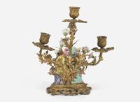 A gilt-bronze mounted Chinese figural porcelain three-light candelabra, the figure 18th century, the gilt bronze 19th century