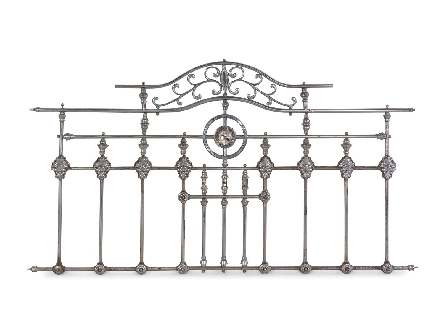 A Continental Steel Four-Post Bed