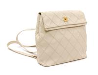 A Chanel Cream Caviar Leather Quilted Backpack, 12"x 10" x 3".