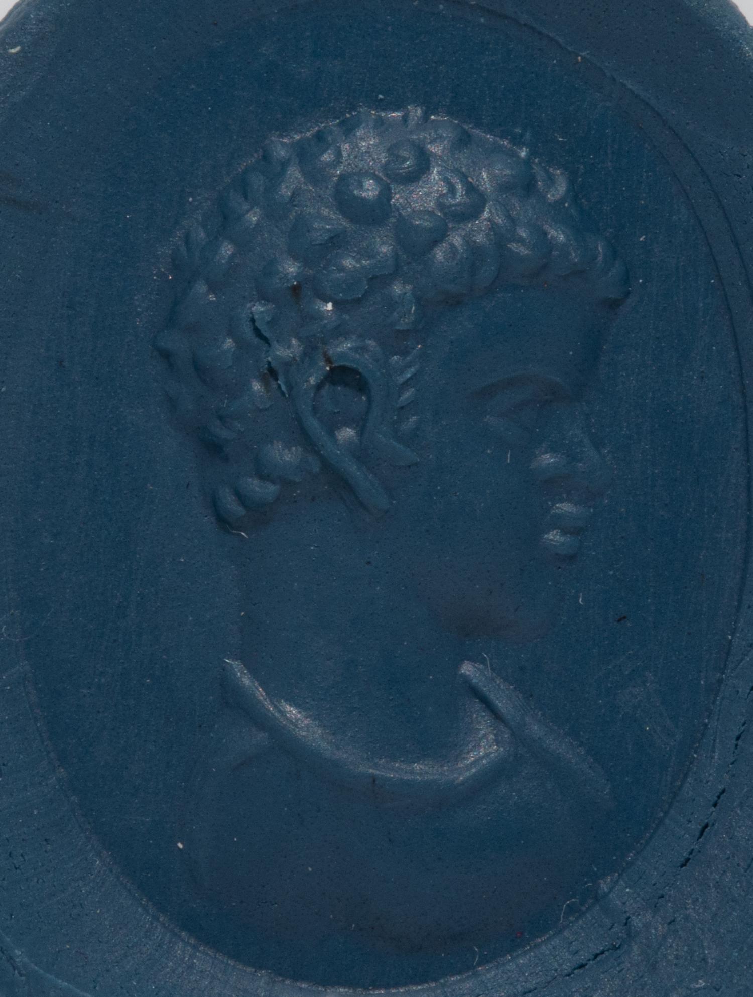 A Roman Black Jasper Ring Stone with a Portrait Head of a Nubian Youth