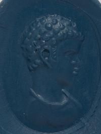 A Roman Black Jasper Ring Stone with a Portrait Head of a Nubian Youth