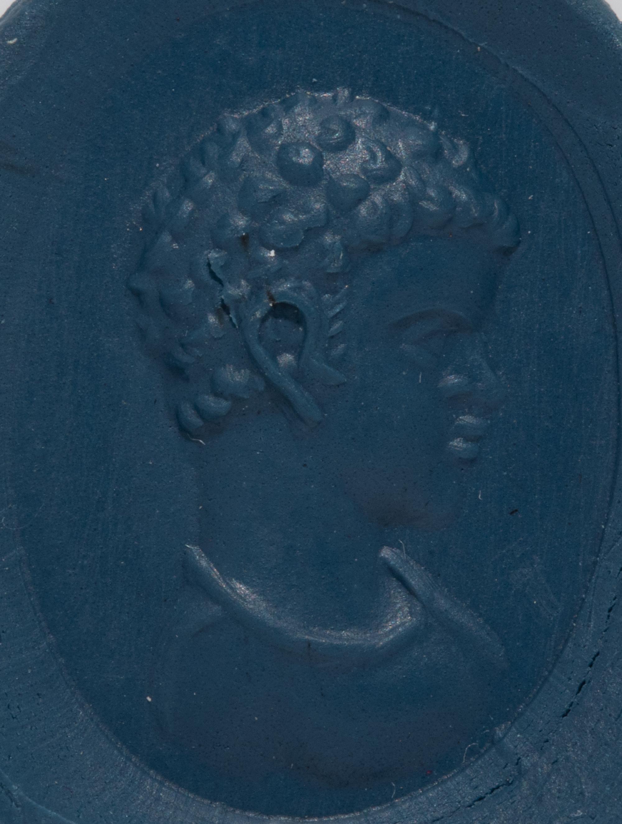 A Roman Black Jasper Ring Stone with a Portrait Head of a Nubian Youth