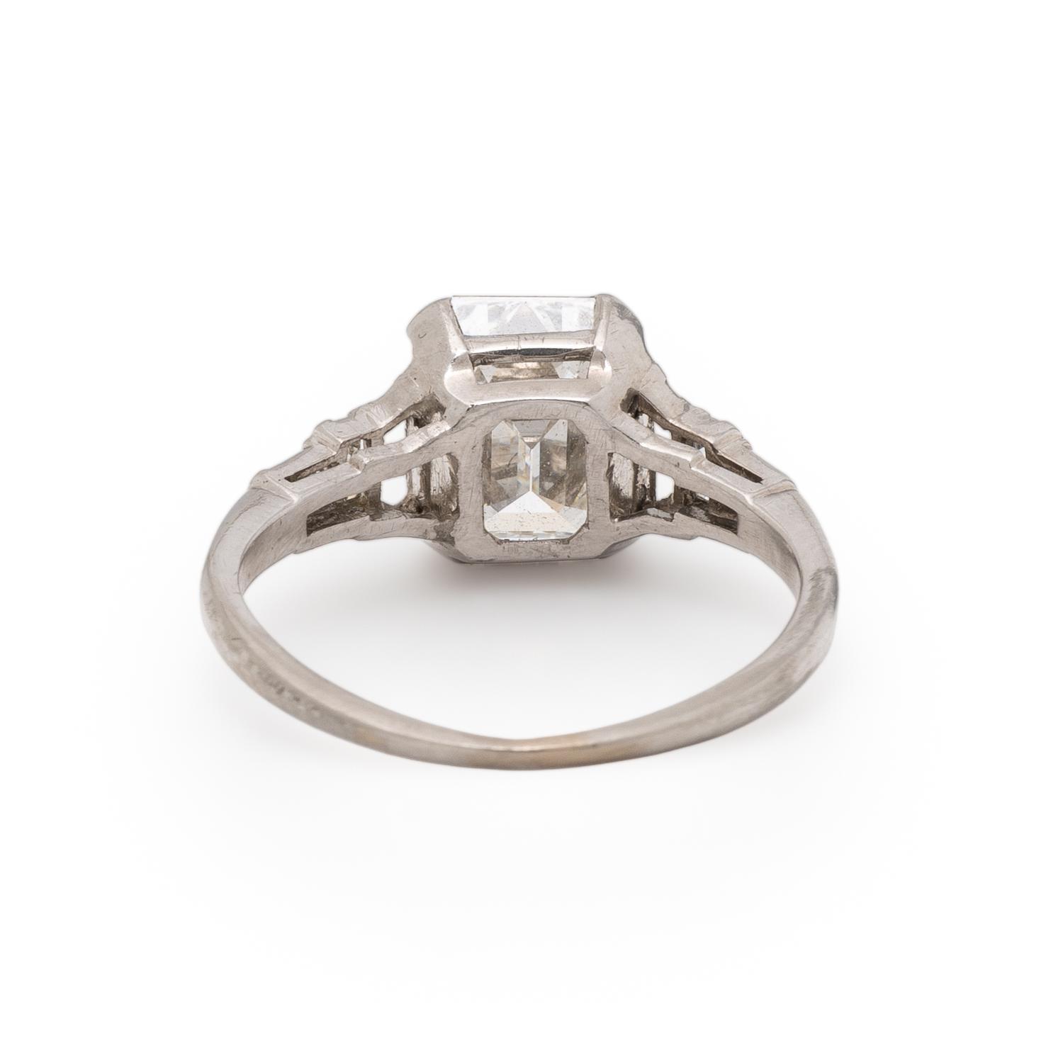 EMERALD CUT DIAMOND AND PLATINUM RING