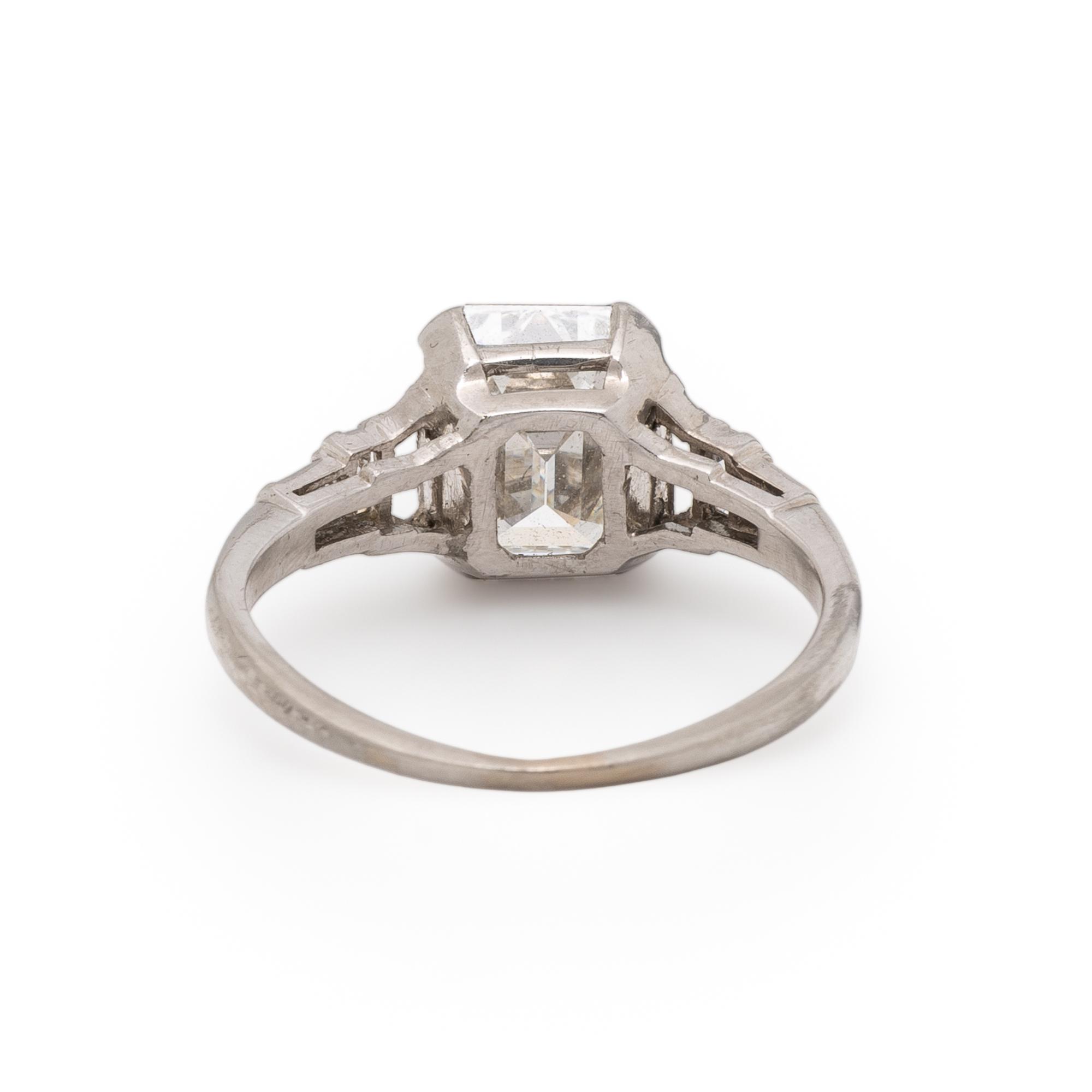 EMERALD CUT DIAMOND AND PLATINUM RING